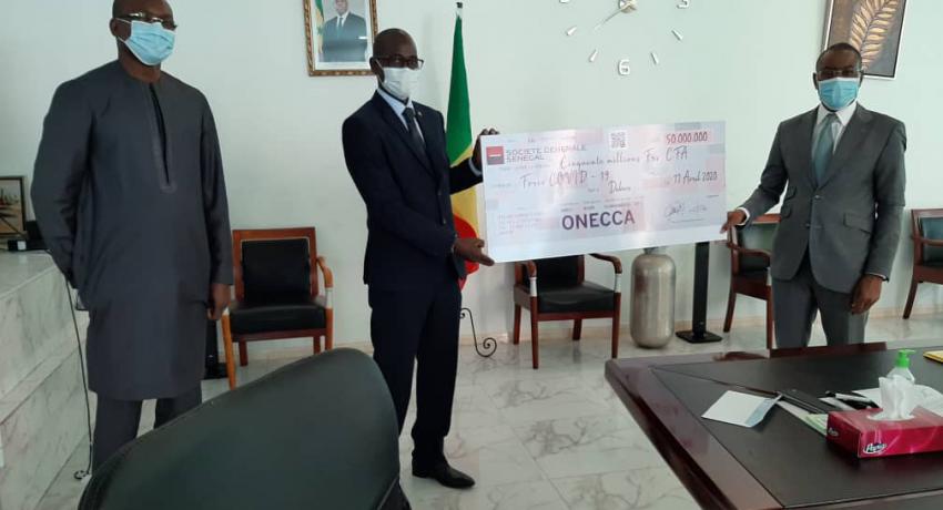 Remise du chèque de CINQUANTE MILLIONS FCFA (50,000,000 FCFA) en guise de contribution de l'ONECCA au MEPC du Sénégal